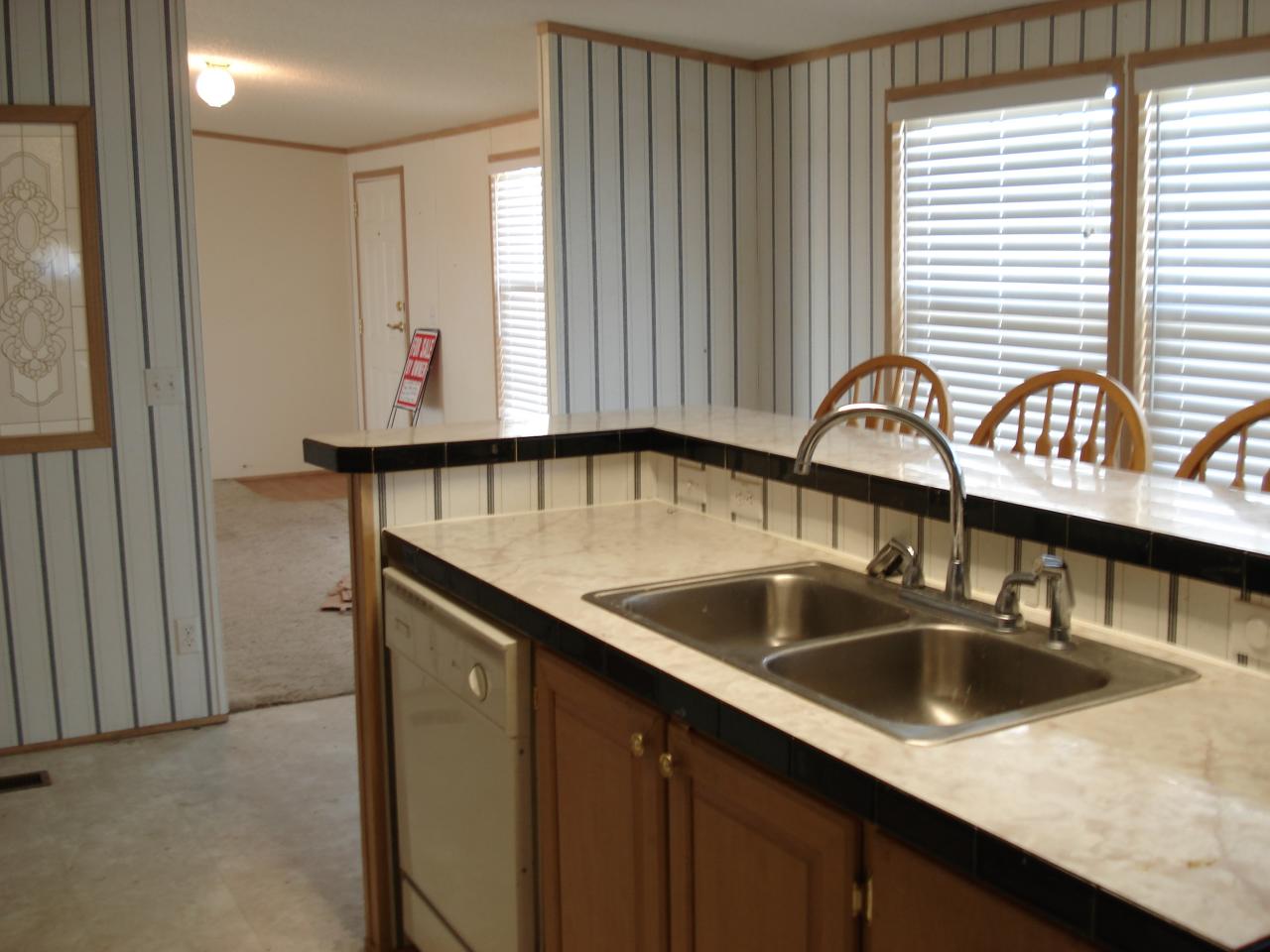 2015 Lick Ridge Road Northeast Check, VA 24072 - Photo 4 of 10 a kitchen with a sink a counter space and a window