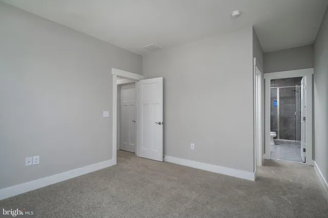 an empty room with closet