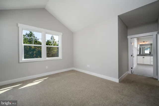 an empty room that has a window