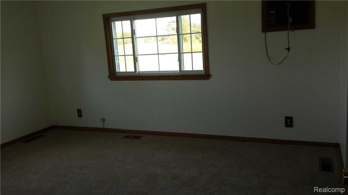 4700 Bricker Road Avoca, MI 48006 - Photo 10 of 16 Master Bedroom with built in air conditioner