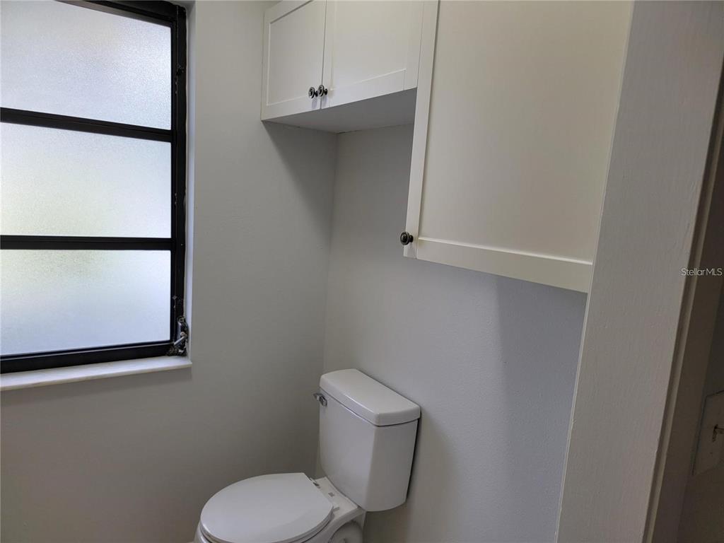 26221 Constantine Road Punta Gorda, FL 33983 - Photo 21 of 27 a bathroom with a toilet