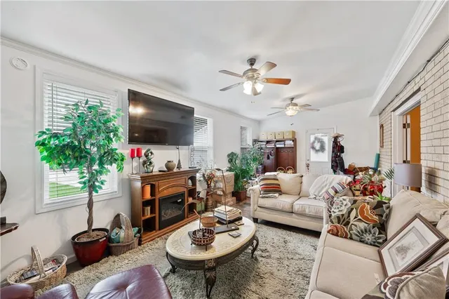 a bedroom with furniture and a wooden floor