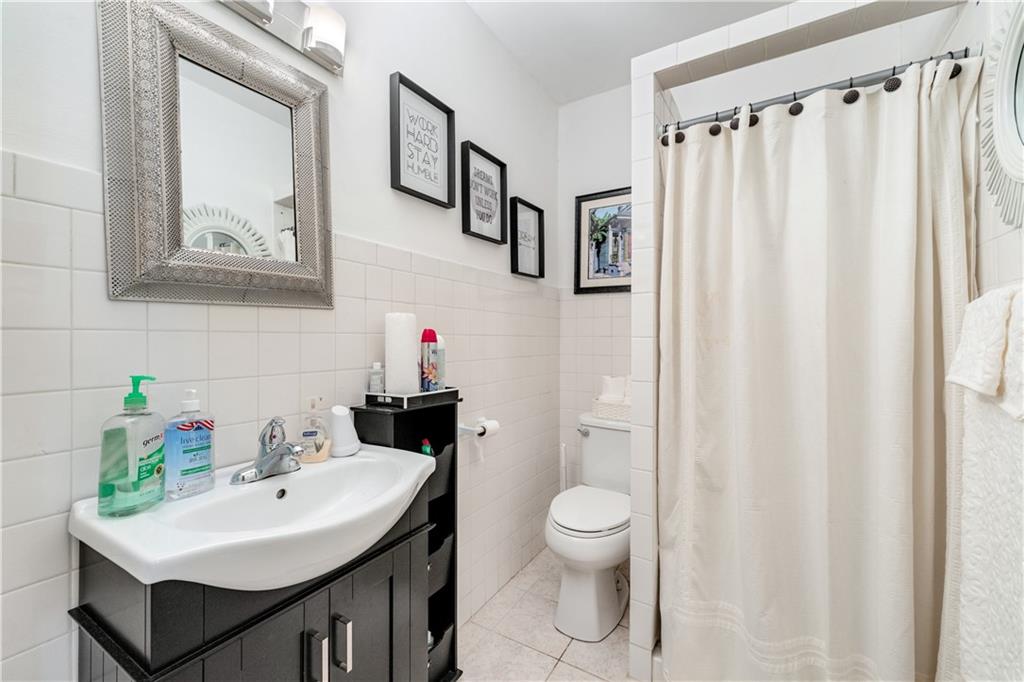 3960 Highway 20 Conyers, GA 30013 - Photo 16 of 57 a bathroom with a sink toilet and shower