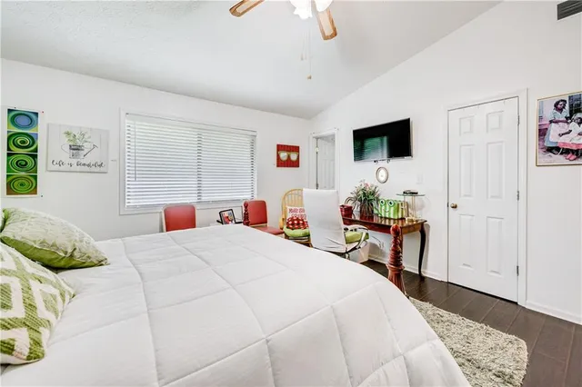 a view of a livingroom with furniture and wooden floor