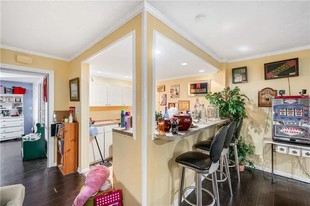 a bed room with a bed and a chair