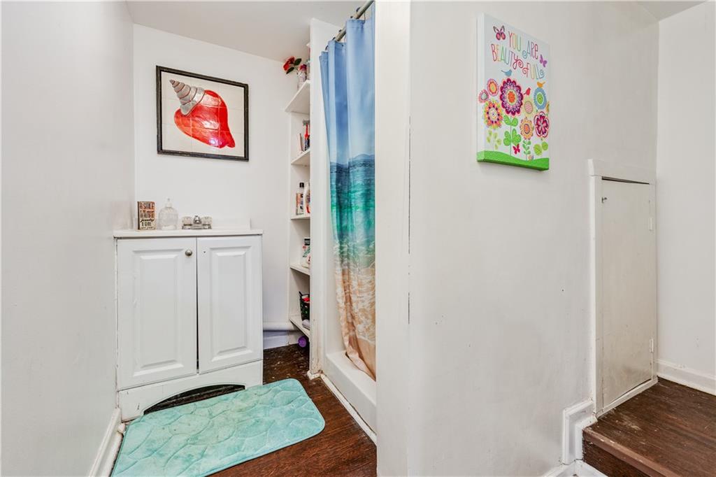 3960 Highway 20 Conyers, GA 30013 - Photo 42 of 57 a room with painting on the wall and a window