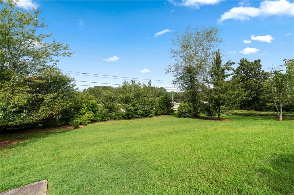 3960 Highway 20 Conyers, GA 30013 - Photo 49 of 57 a view of a green yard