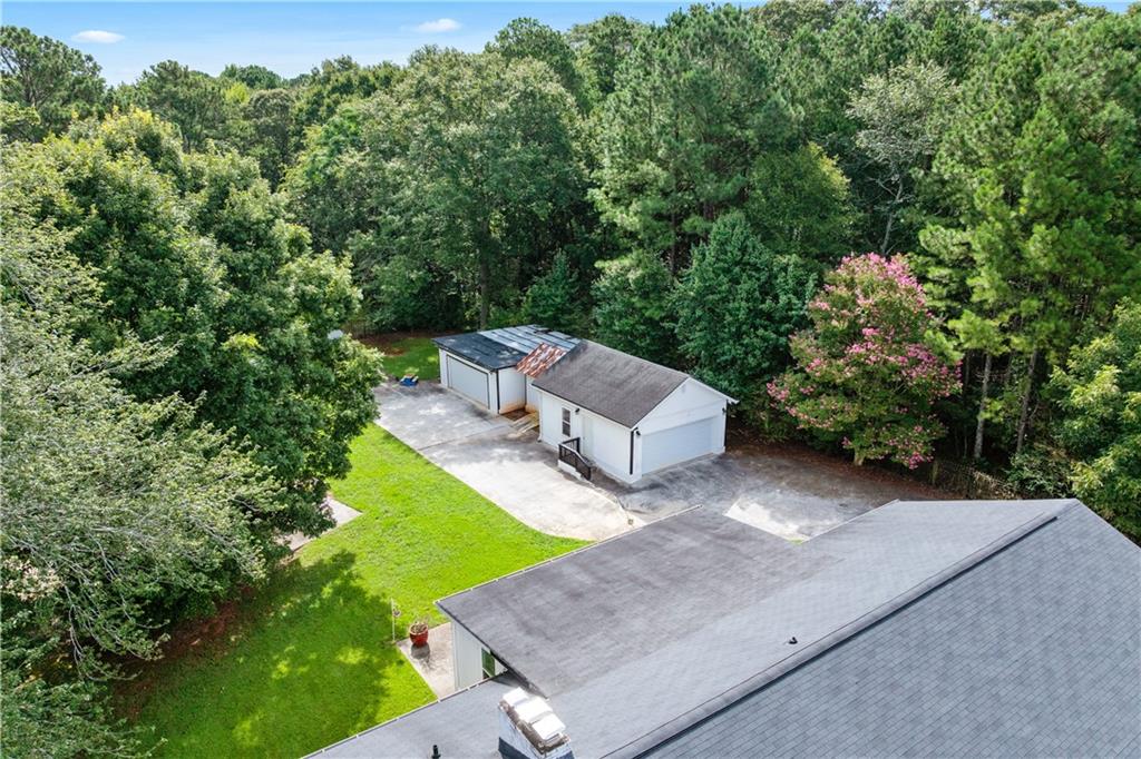 3960 Highway 20 Conyers, GA 30013 - Photo 52 of 57 an aerial view of a house with garden space and sitting area