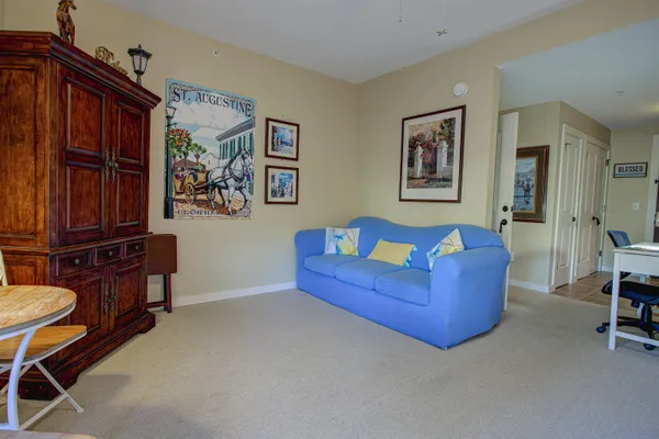 a bathroom with a toilet sink and shower