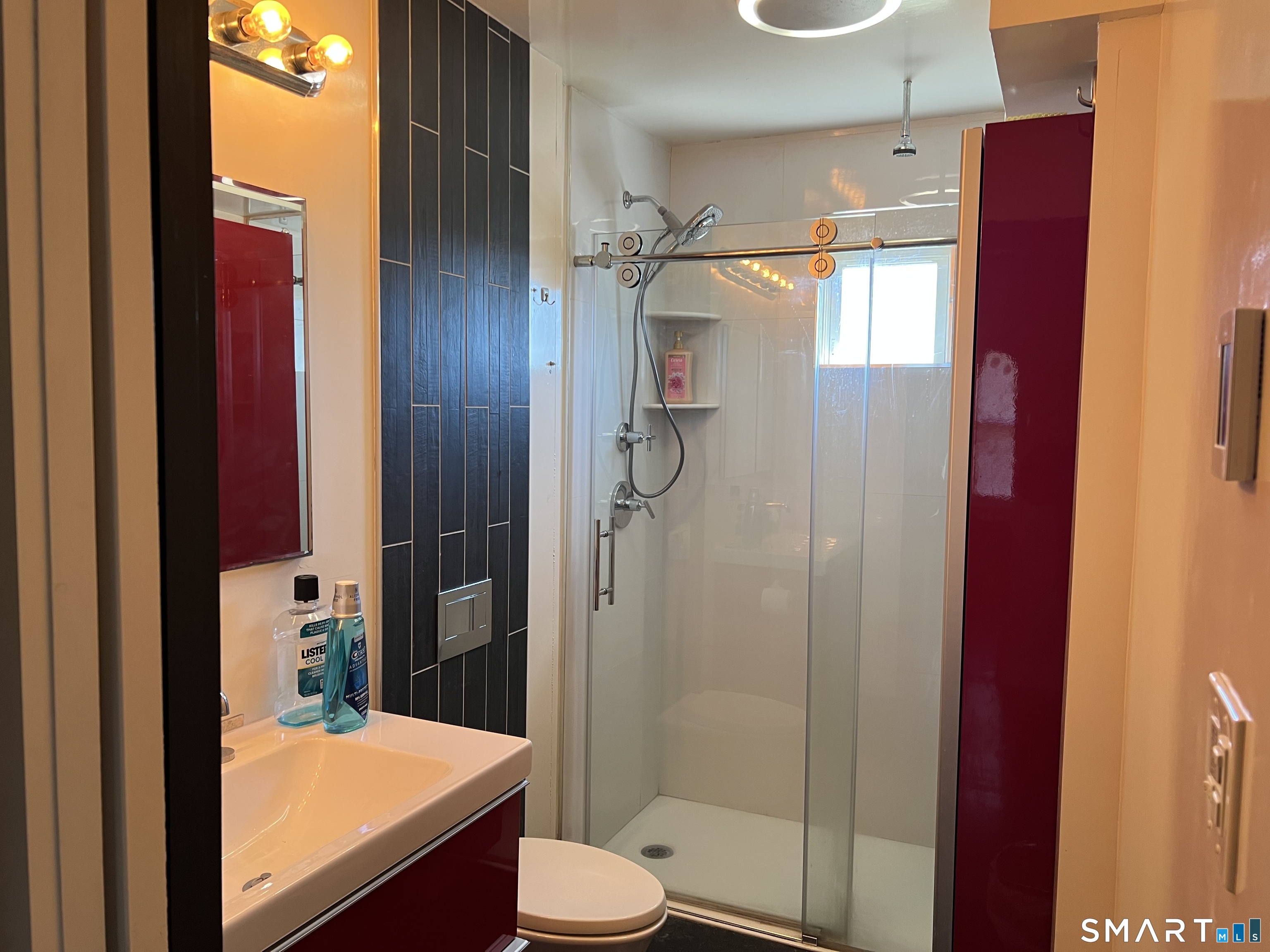 37 Canaan Court, Unit 22 Stratford, CT 06614 - Photo 12 of 16 a bathroom with a sink and toilet