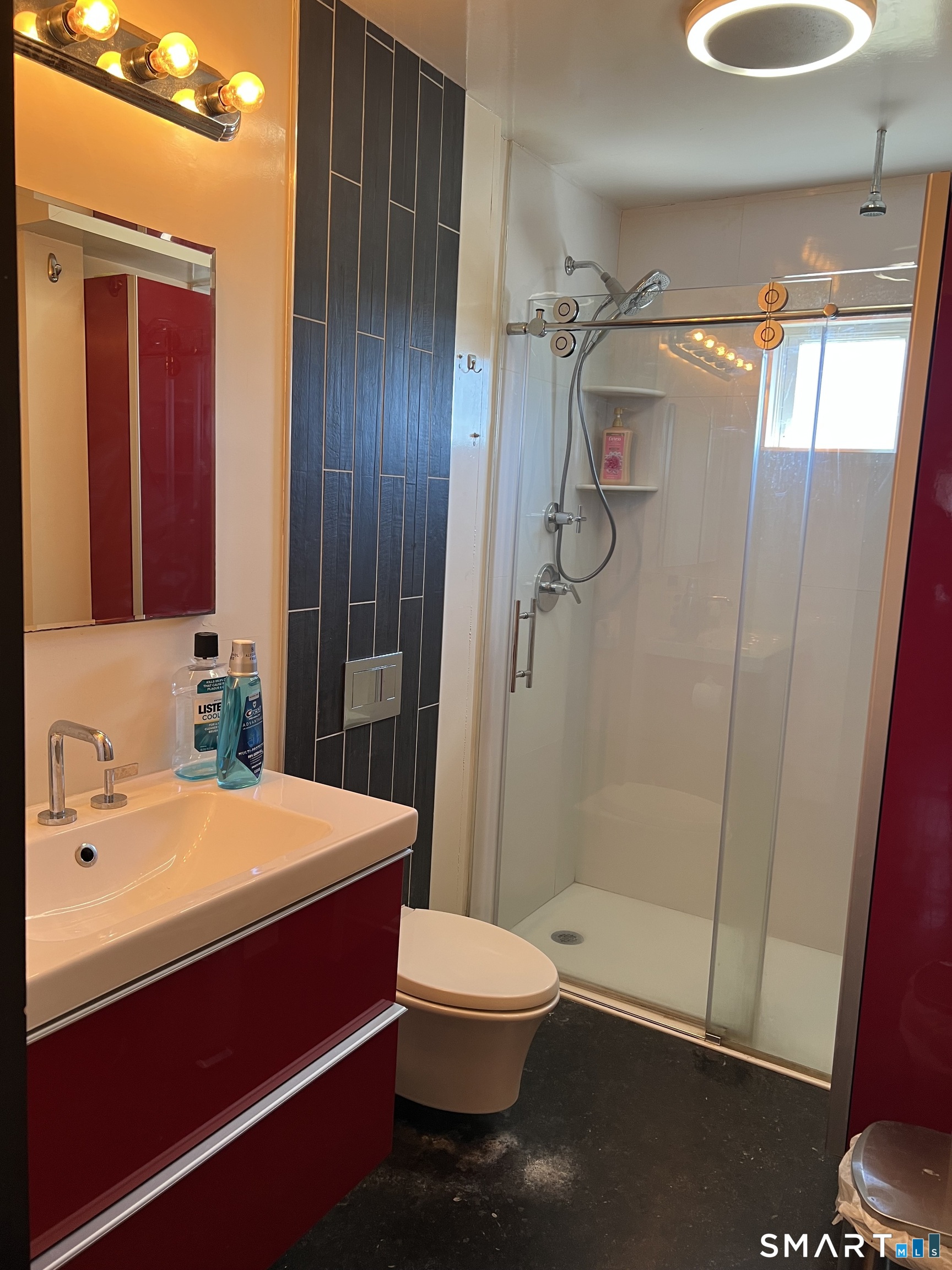 37 Canaan Court, Unit 22 Stratford, CT 06614 - Photo 13 of 16 a bathroom with a sink a toilet and shower