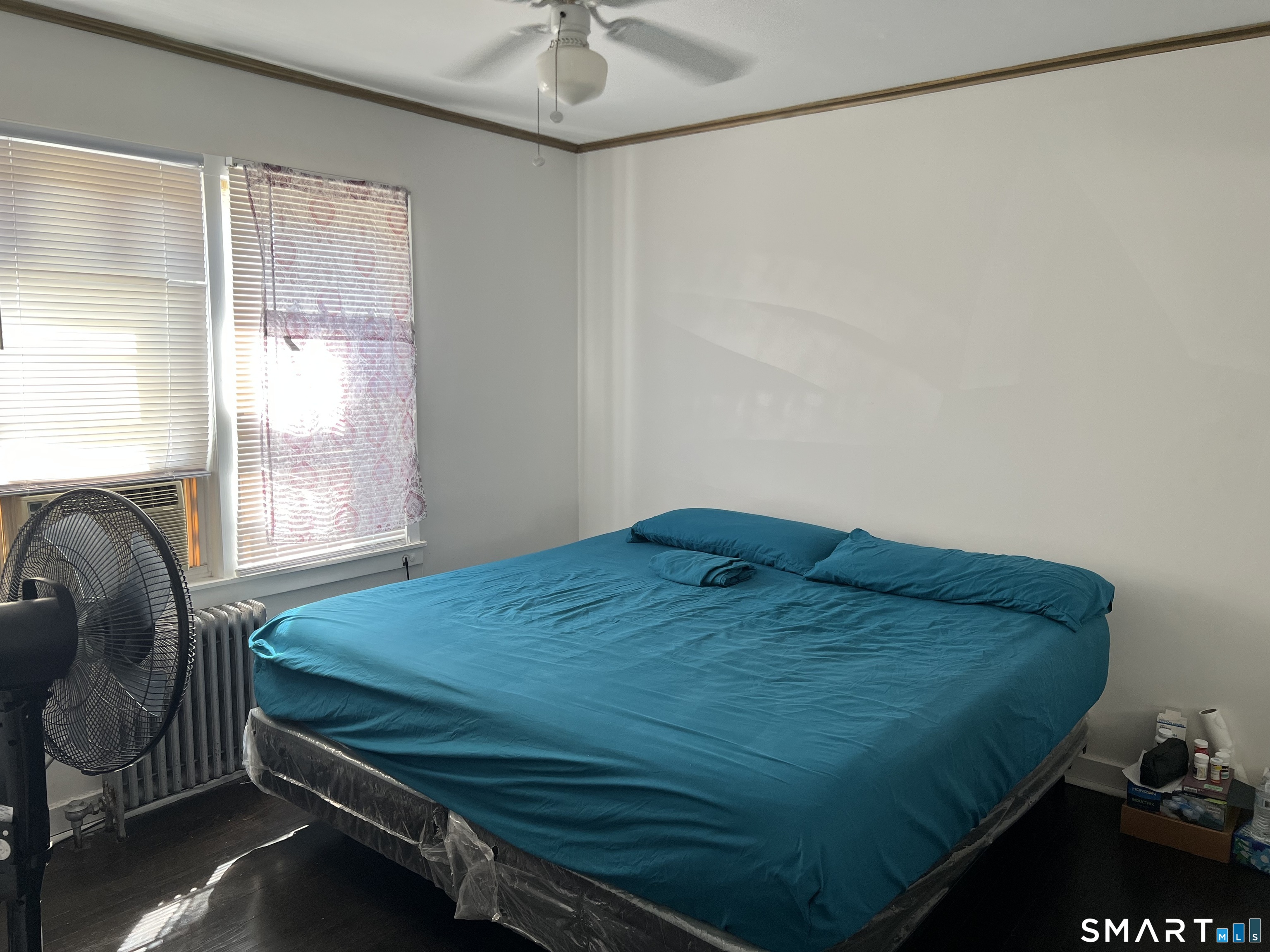 37 Canaan Court, Unit 22 Stratford, CT 06614 - Photo 8 of 16 a bedroom with a bed and a window