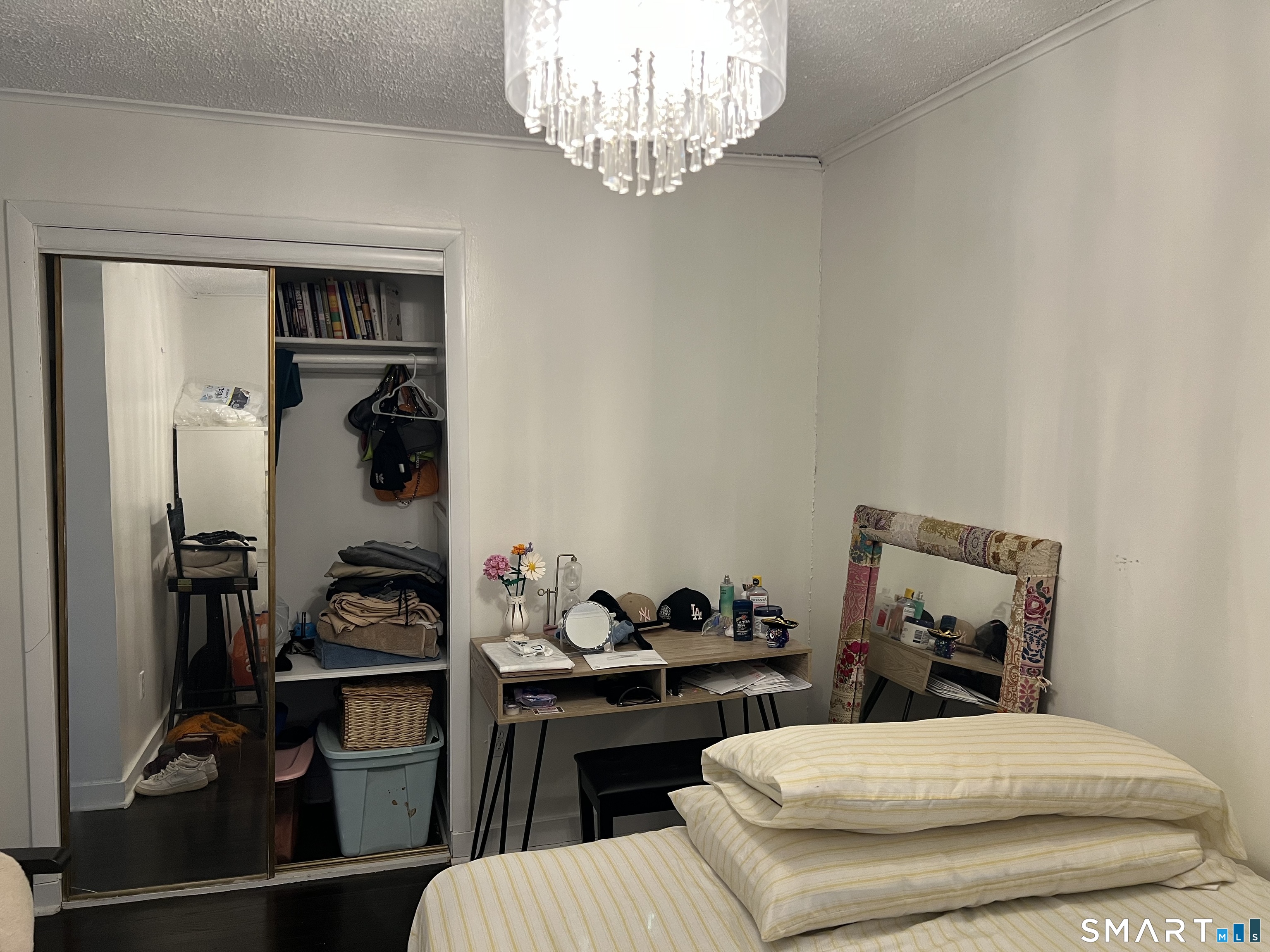 37 Canaan Court, Unit 22 Stratford, CT 06614 - Photo 9 of 16 a bathroom with a sink and a mirror