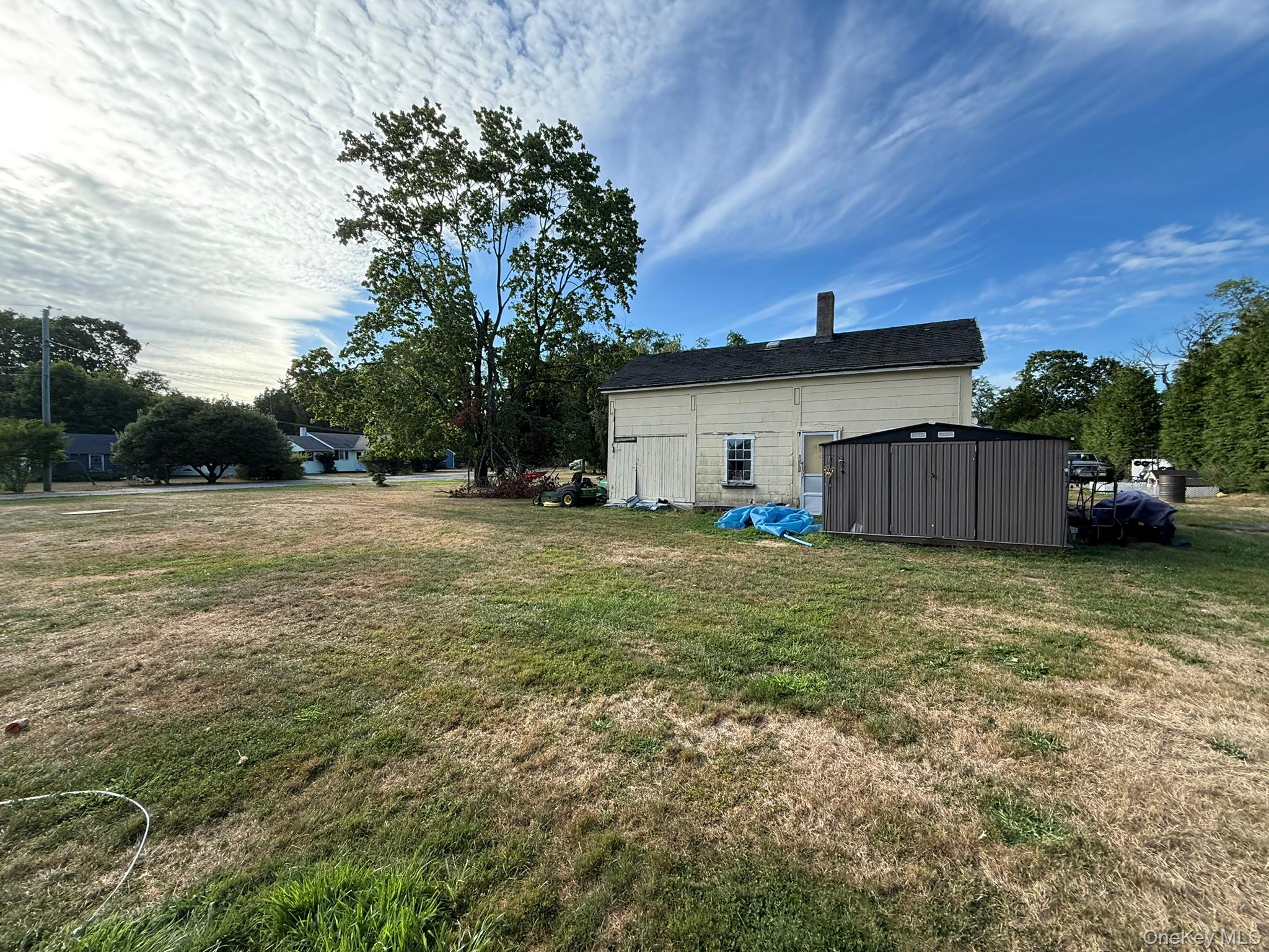 11005 Main Road East Marion, NY 11939 - Photo 19 of 26 a fire hydrant in the middle of a field