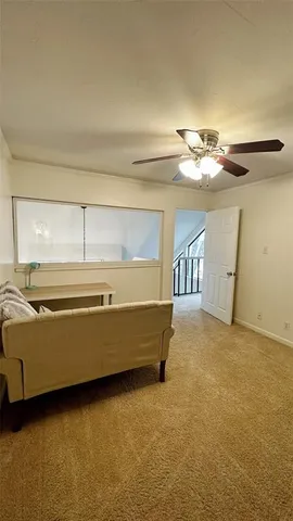 a room with a bed and a chandelier