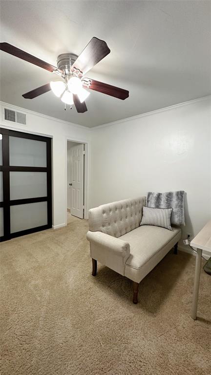 18240 Midway Road, Unit 104 Dallas, TX 75287 - Photo 10 of 22 a living room with furniture and a ceiling fan