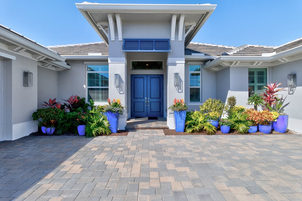 5594 Bent Pine Square Vero Beach, FL 32967 - Photo 2 of 35 a front view of a house