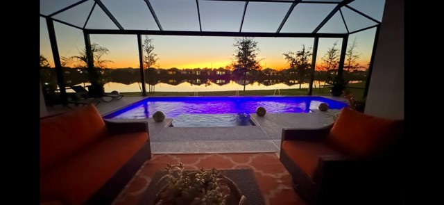 5594 Bent Pine Square Vero Beach, FL 32967 - Photo 35 of 35 a balcony with table and chairs