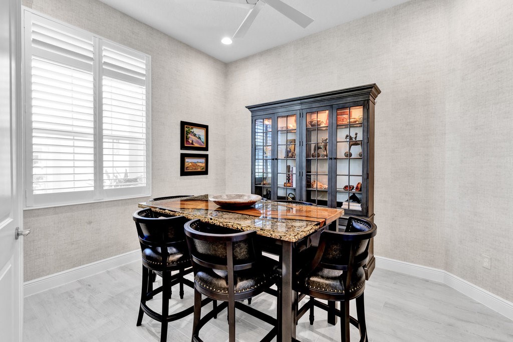 5594 Bent Pine Square Vero Beach, FL 32967 - Photo 6 of 35 a dining room with furniture and window