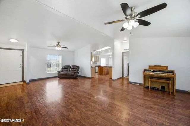 a view of livingroom with furniture and wooden floor