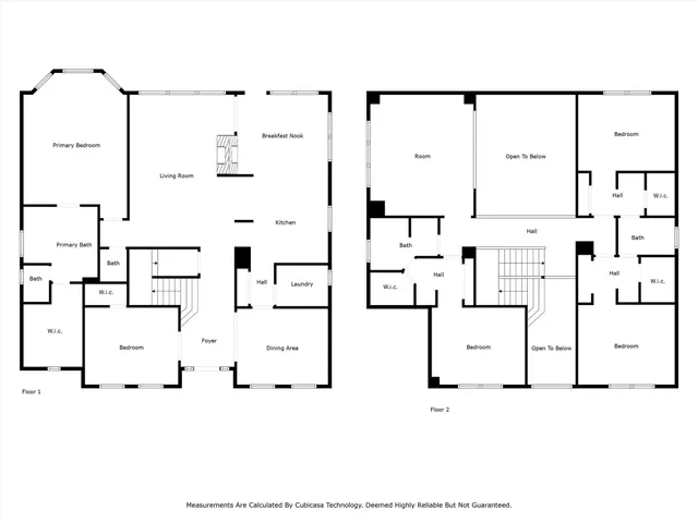 a black white and white photo of a living room