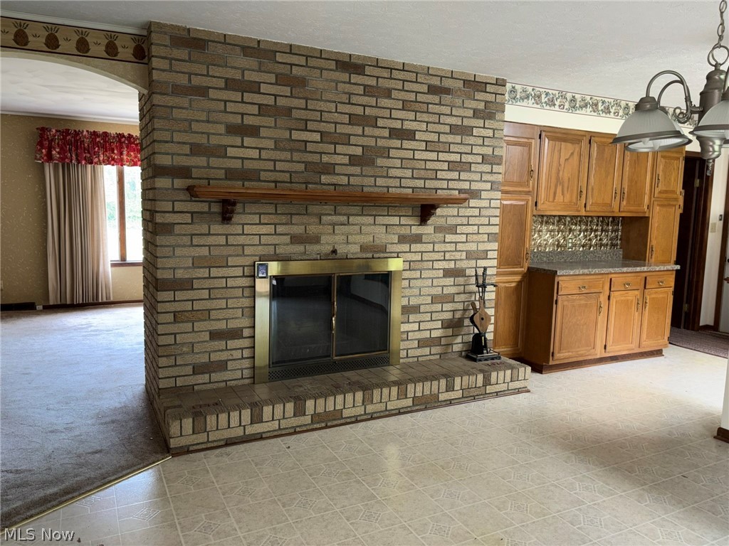 6308 Coen Road Vermilion, OH 44089 - Photo 11 of 40 fireplace in dining area