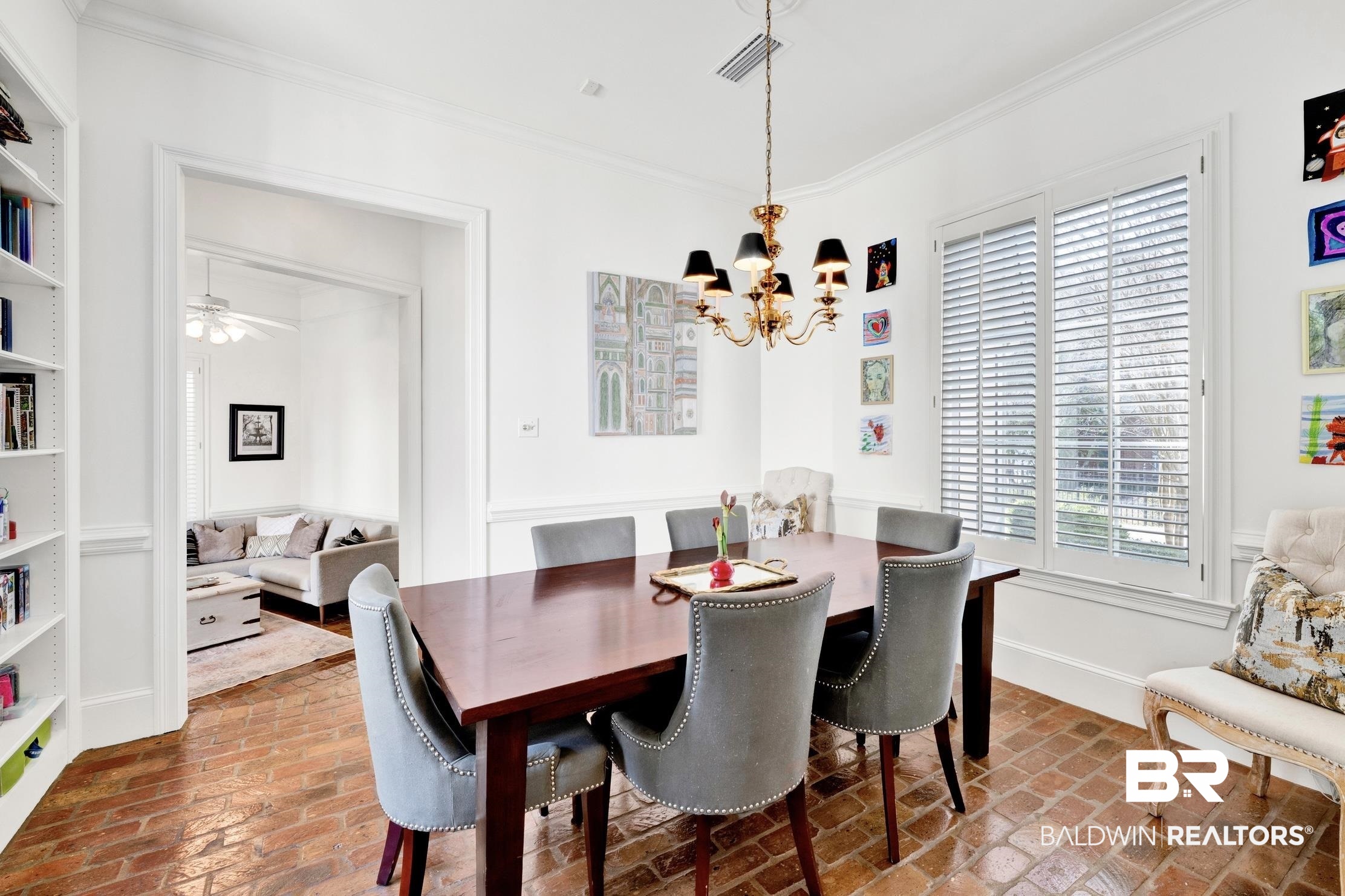 4 Savannah Court Mobile, AL 36608 - Photo 12 of 32 Dining room with ornamental molding, ceiling fan, brick flooring, and suspended lighting