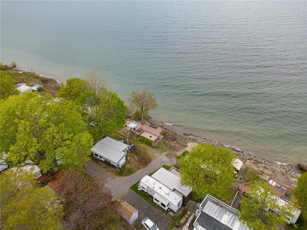 7945 Lake Road, Unit 86 Sodus, NY 14555 - Photo 5 of 22 Set a bit back from the water - a more comfortable