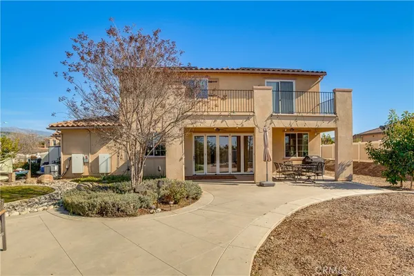 a view of a building with a tree