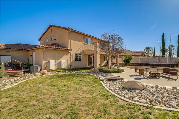 a view of a house with swimming pool
