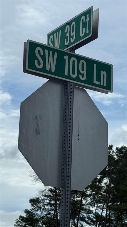 Tbd Southwest 39th Court Ocala, FL 34476 - Photo 6 of 6 a street sign that is on a pole