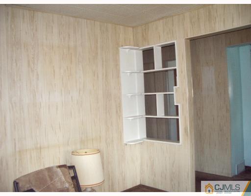 21 Wilcox Road New Brunswick, NJ 08901 - Photo 3 of 10 a bathroom with a toilet and a shower