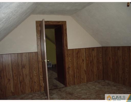 21 Wilcox Road New Brunswick, NJ 08901 - Photo 8 of 10 a view of a wooden door
