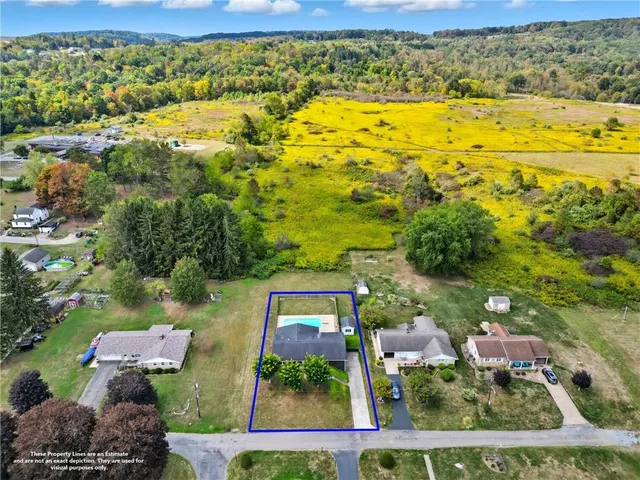 a view of a yard with an outdoor space