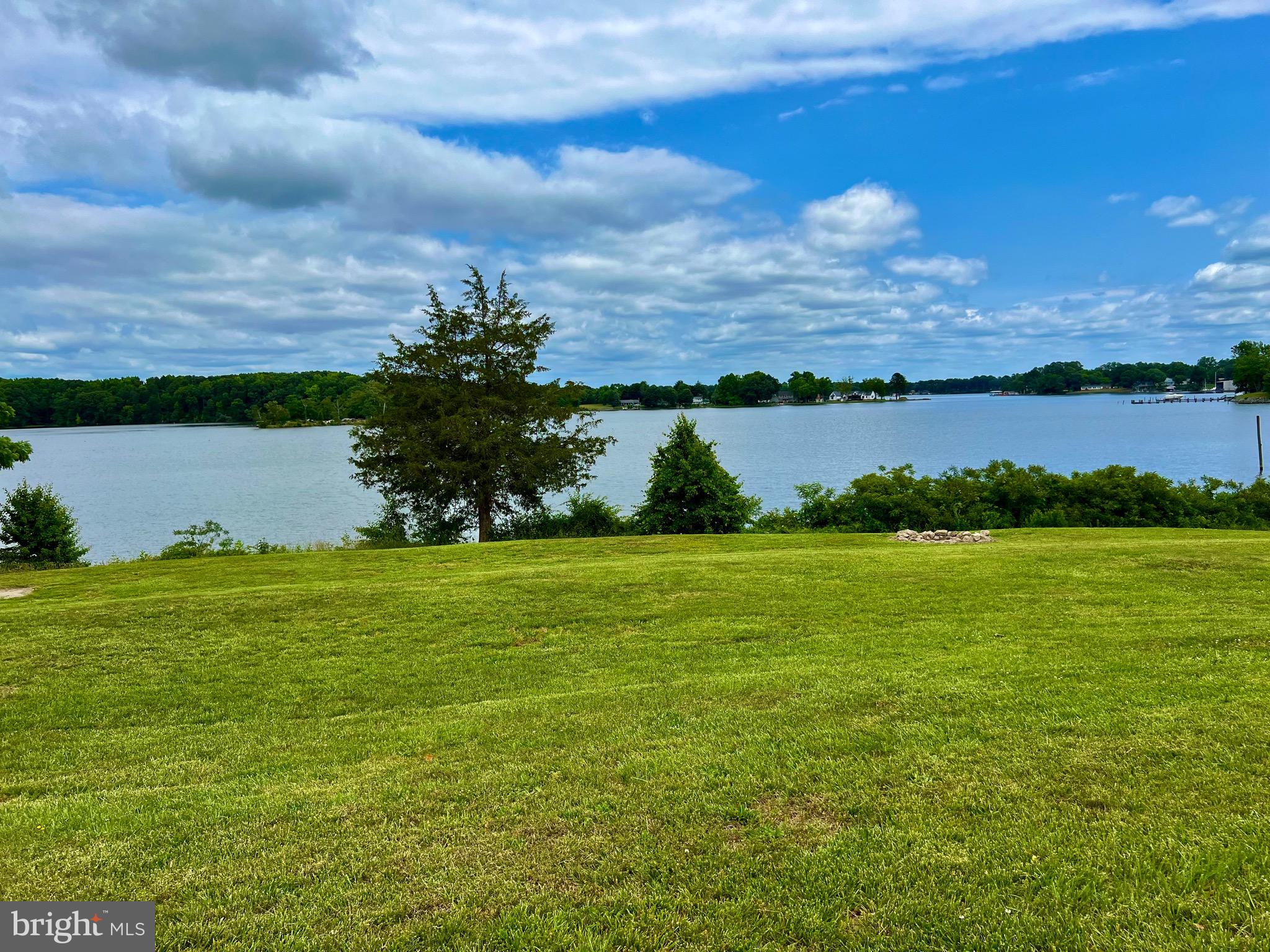 982 Mattox Avenue Colonial Beach, VA 22443 - Photo 38 of 53 a view of a lake and a yard