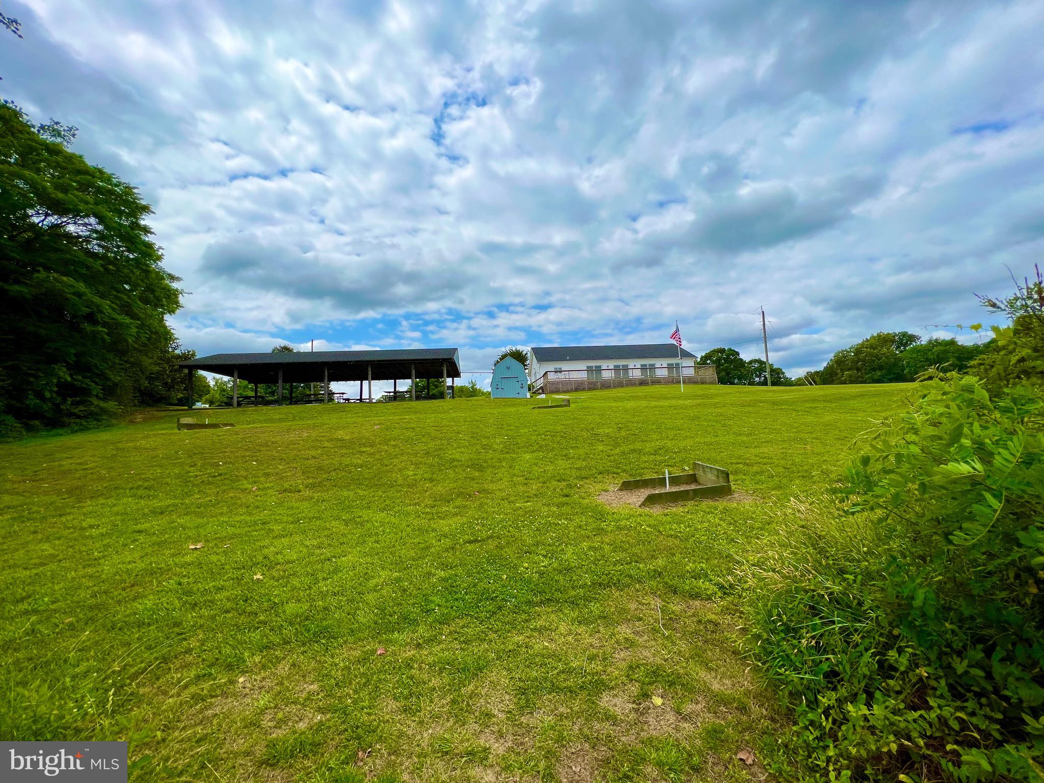 982 Mattox Avenue Colonial Beach, VA 22443 - Photo 42 of 53 a view of a lake with houses in the back
