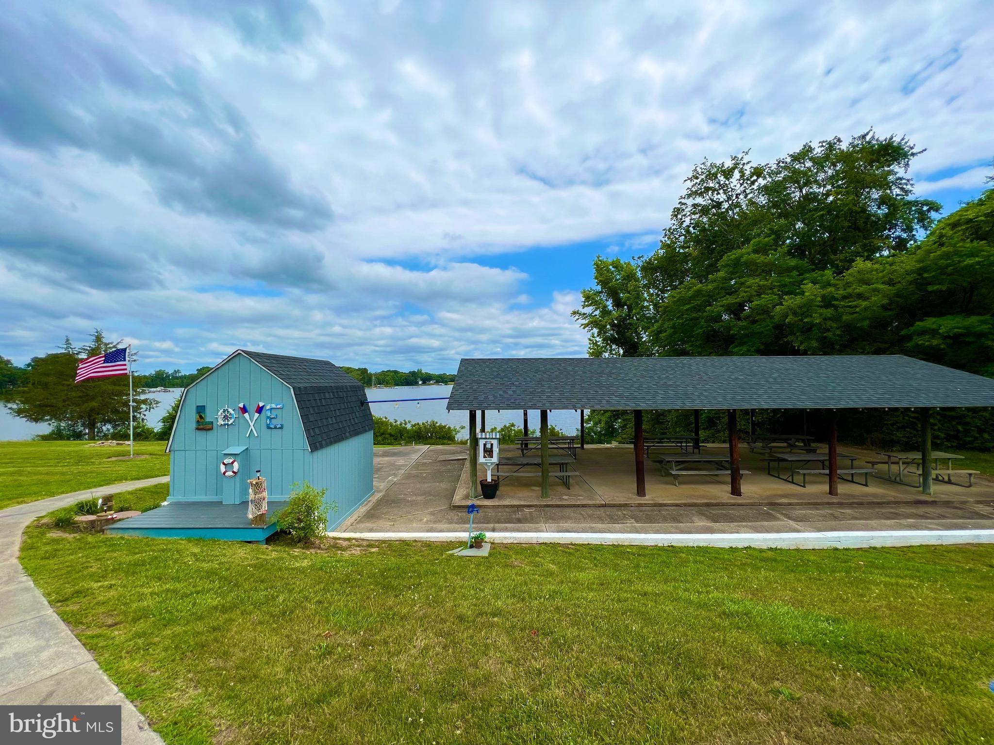 982 Mattox Avenue Colonial Beach, VA 22443 - Photo 43 of 53 a view of swimming pool with a yard