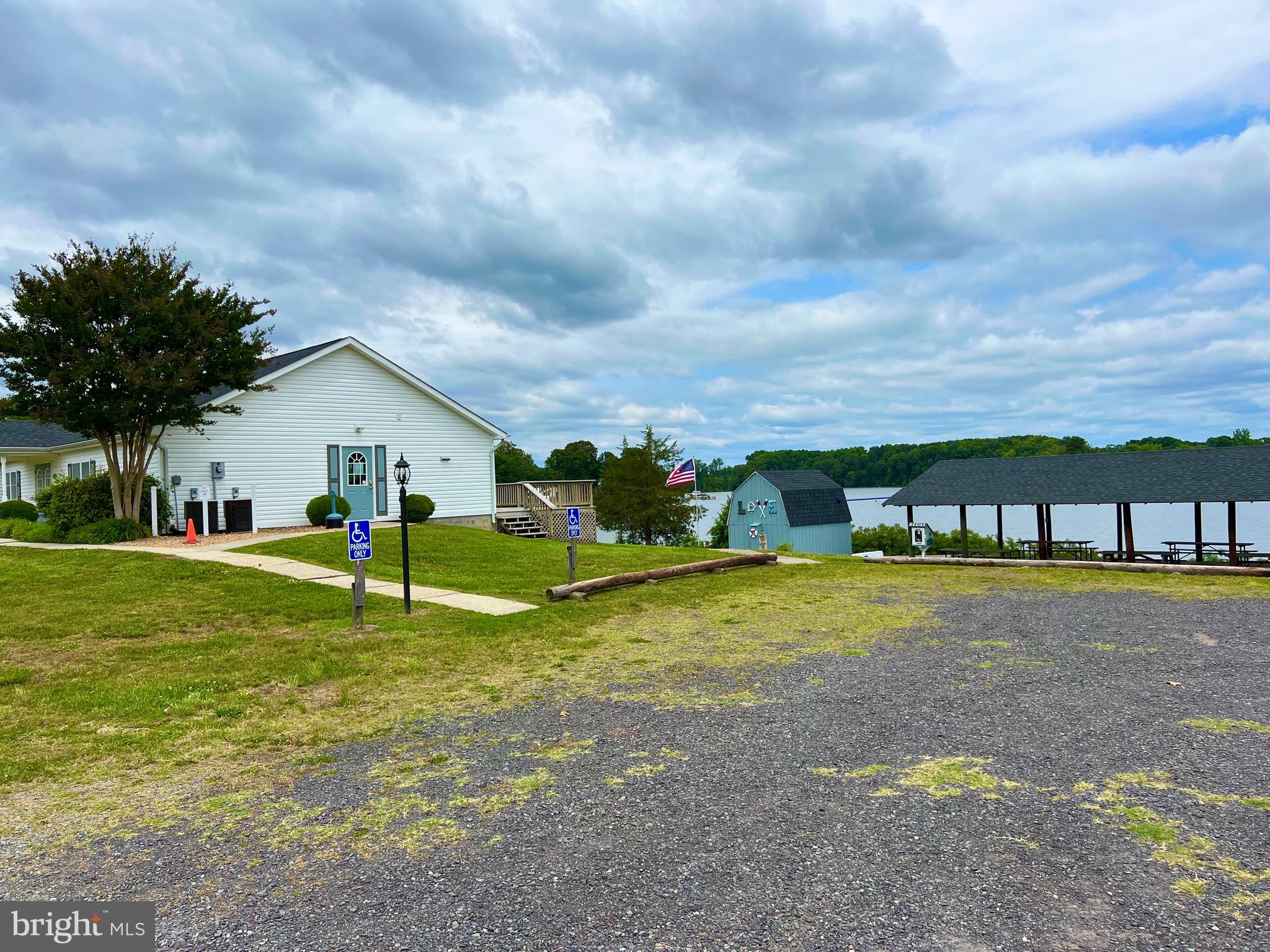 982 Mattox Avenue Colonial Beach, VA 22443 - Photo 44 of 53 a front view of house with garden