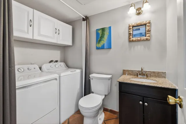 a bathroom with a toilet and a bathtub