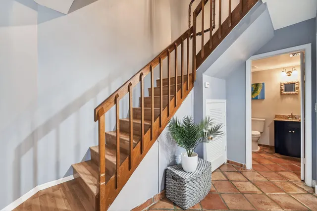a bathroom with a double vanity sink mirror and double