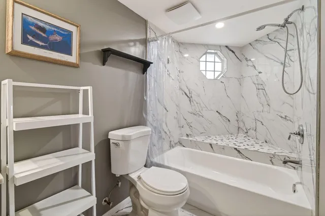 a view of an entryway with flower plants
