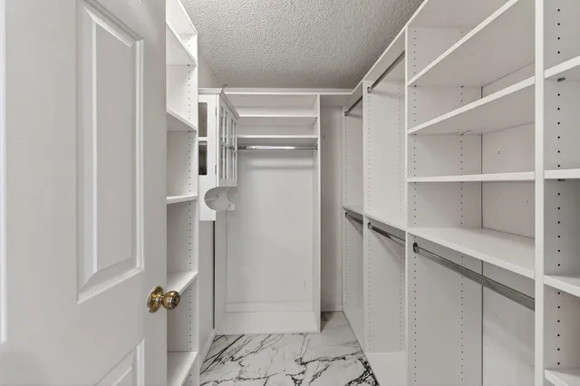 a view of a lake with a yard