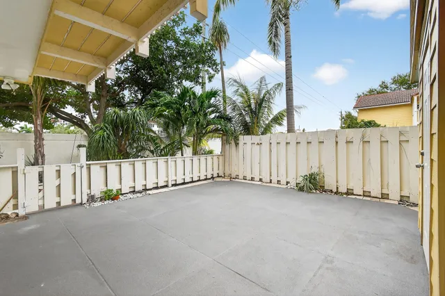 a kitchen with stainless steel appliances granite countertop a stove a refrigerator and a microwave