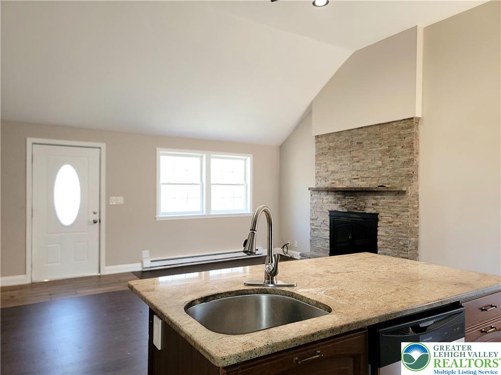 867 Underwood Road West East Stroudsburg, PA 18302 - Photo 6 of 28 a kitchen with a sink cabinets and wooden floor