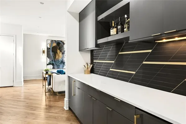 a kitchen with a dining table and chairs