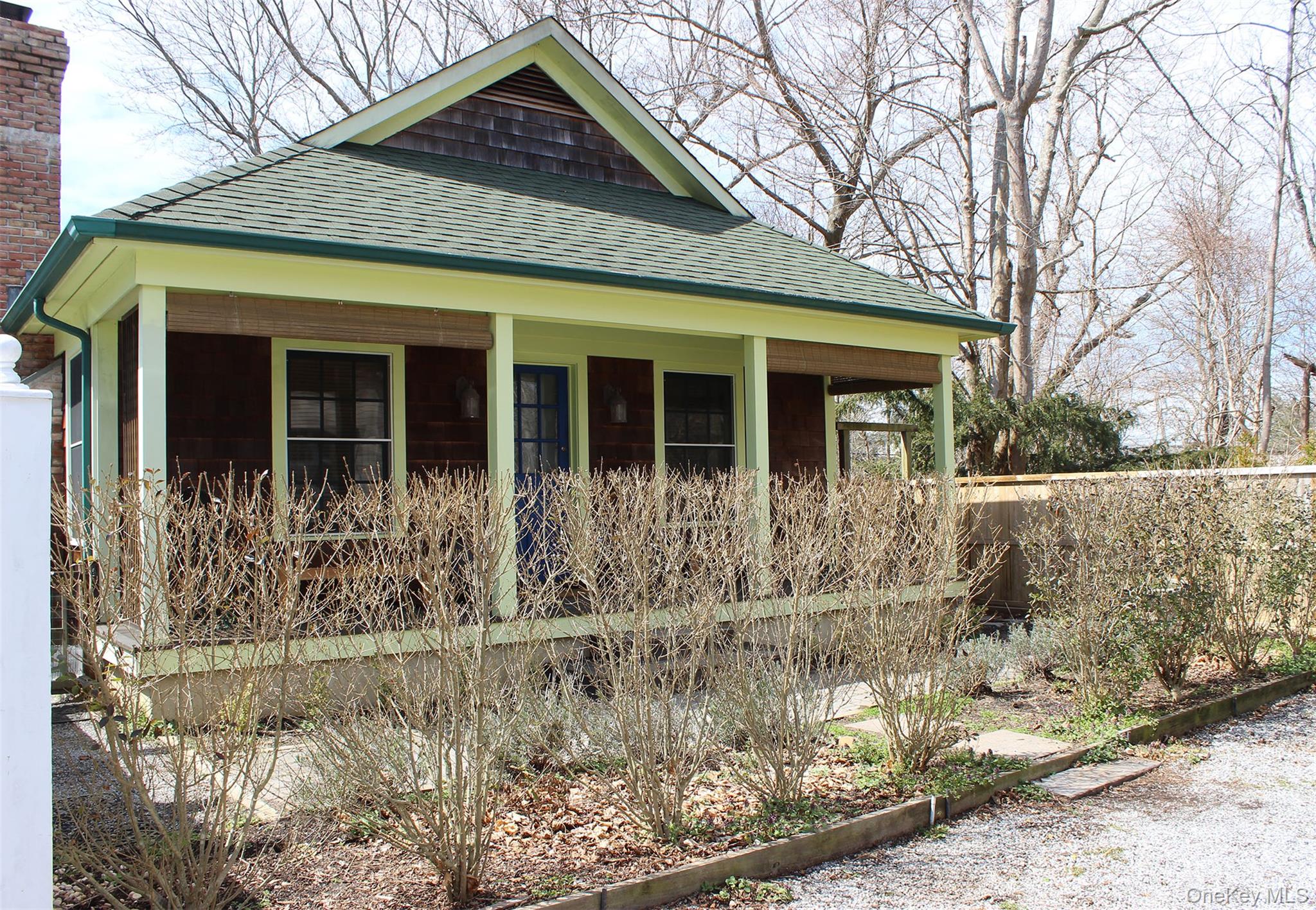 21 North Sea Road Southampton, NY 11968 - Photo 2 of 4 front view of a house with a yard