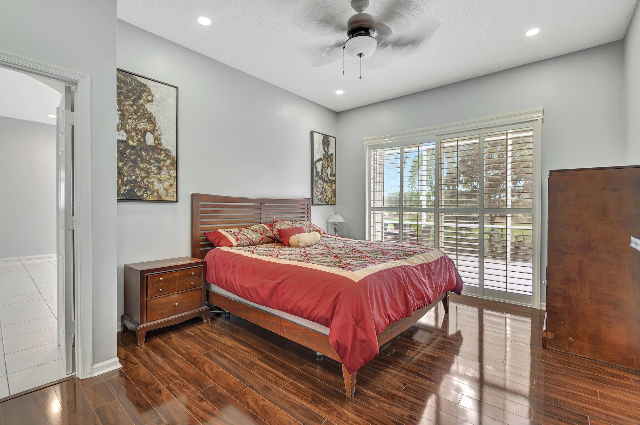 10929 Old Bridgeport Lane Boca Raton, FL 33498 - Photo 14 of 43 Primary showing bed ntstnds patio planta