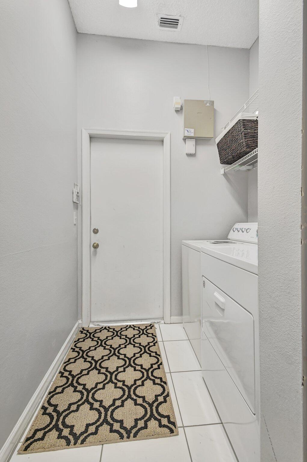 10929 Old Bridgeport Lane Boca Raton, FL 33498 - Photo 23 of 43 Laundry room entry to garage