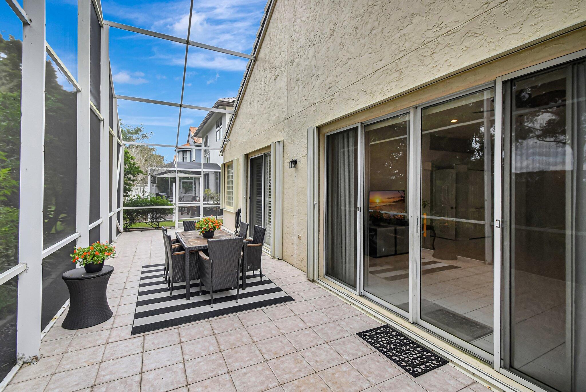 10929 Old Bridgeport Lane Boca Raton, FL 33498 - Photo 25 of 43 Patio from back left showing view of rea
