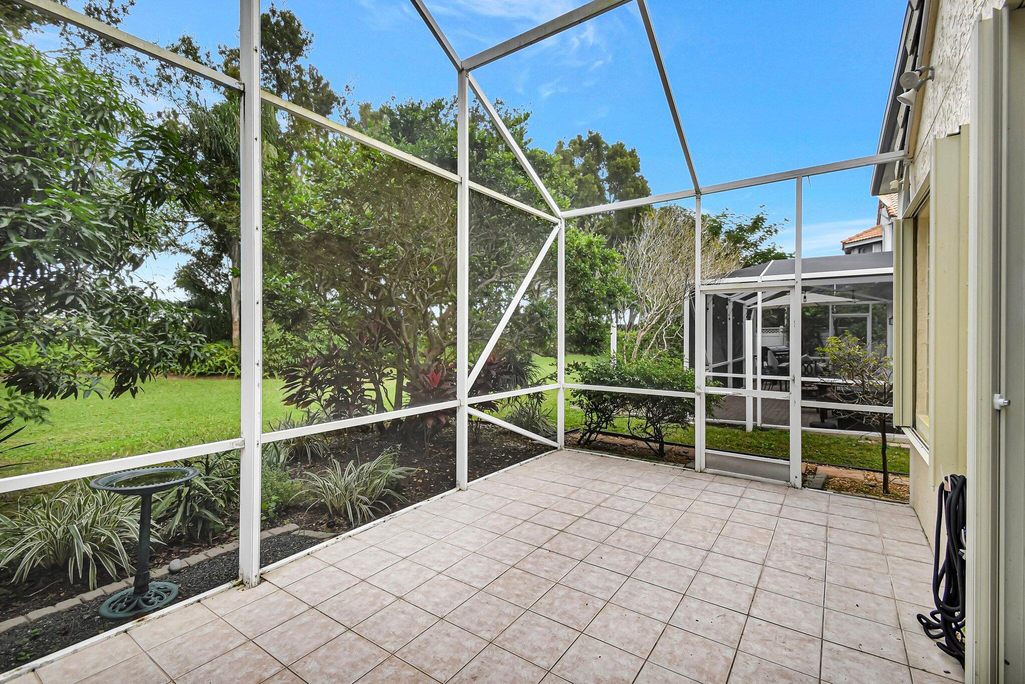 10929 Old Bridgeport Lane Boca Raton, FL 33498 - Photo 27 of 43 Patio right side showing birdbath4